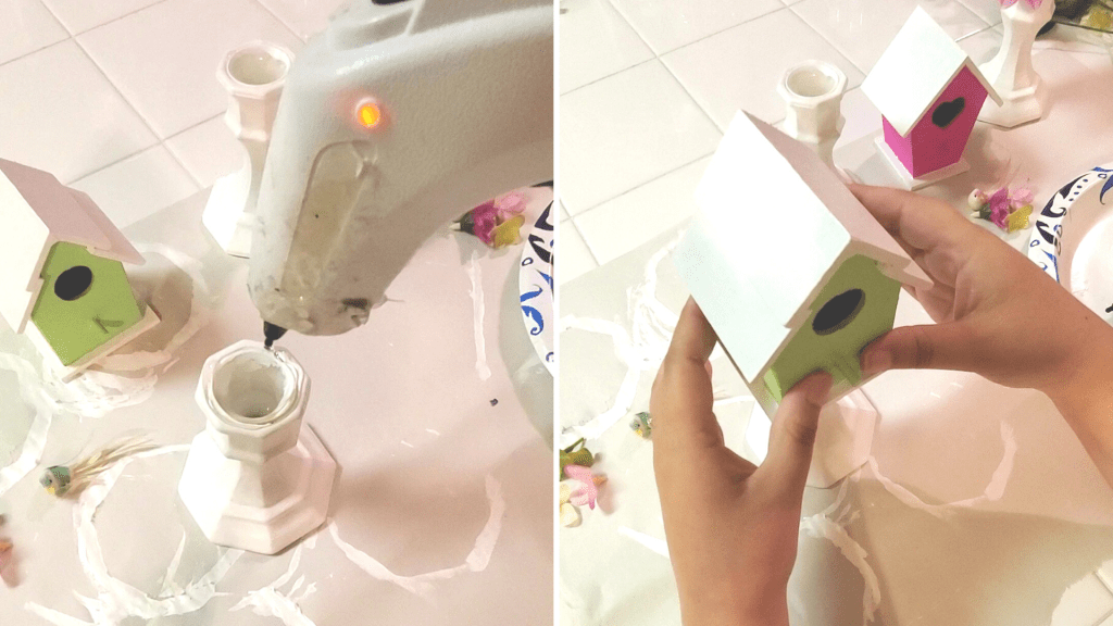 These DIY Decorative Candlestick Birdhouses are the perfect Spring decor DIY! Make your own beautiful Spring decor DIY with this step by step tutorial! Here, hot glue is applied to the top of the candlesticks and the birdhouses are adhered to the candlesticks. 