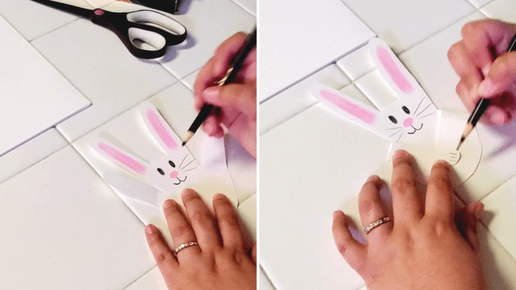 A fun and easy spring craft for families, these adorable bunnies are made out of your handprint!
Here, with a black colored pencil, add whiskers on either side of the bunny's face. Then, fold down the pinky and thumb to make the bunny's arms, and with a black colored pencil, create the bunny's toes. 