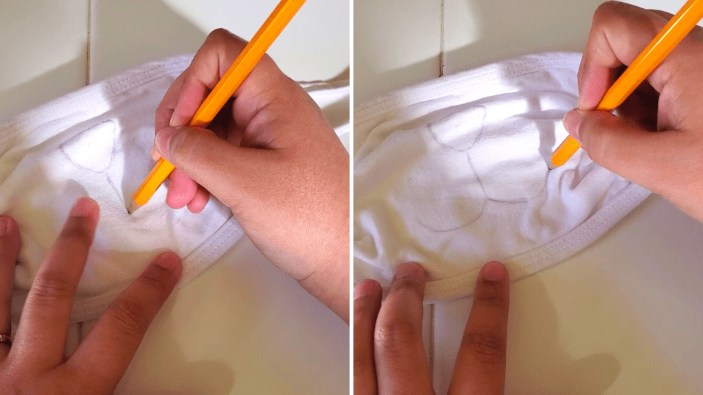 This quick and easy DIY Bunny Face Mask is perfect for kids and adults alike! This Easter face mask DIY makes for some spring fun for families, too! This mask pairs well with a spring or Easter outfit and is a great Easter basket for kids!
Here, draw the bunny's mouth. 